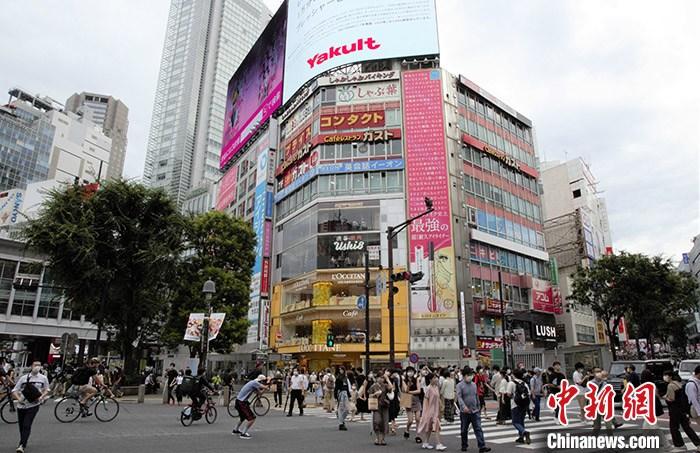资料图：当地时间7月11日，东京年轻人聚集地涩谷街头，人流密集。/p中新社记者 吕少威 摄